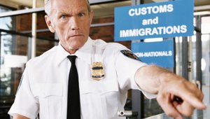 US_customs_officer_airport_small.jpg